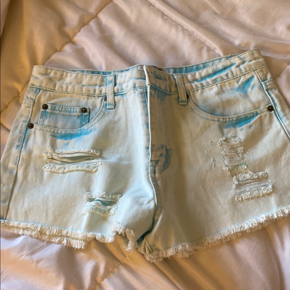 High-Waisted Blue Jean Shorts with Distressed Detailing